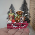 Load image into Gallery viewer, Miniature Snowy Christmas Vignette – Le Coffre D’Emilie on a hand, close-up