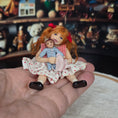 Load image into Gallery viewer, Bonnie Justice OOAK Seated Clay Girl Doll with her Toy Doll Signed 2005