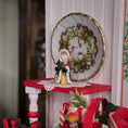 Load image into Gallery viewer, Old World Miniature Santa Figurine by Ann Anderson displayed on a holiday side table