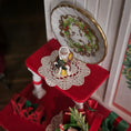 Load image into Gallery viewer, Old World Miniature Santa Figurine by Ann Anderson, top view on red accent table