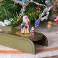 Load image into Gallery viewer, Santa Figurine Ann Anderson 1:48 Vintage 2003 compared next to a larger figure