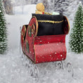 Load image into Gallery viewer, Red toy sleigh with a teddy bear in a snowy landscape, back view