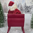 Load image into Gallery viewer, the back of a Santa dollhouse doll in his red sleigh