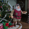 Load image into Gallery viewer, Old Christmas Elf doll holding a plate near a decorated Christmas tree.