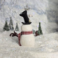 Load image into Gallery viewer, Decorative snowman miniature with a top hat and scarf against a snowy background