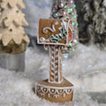Load image into Gallery viewer, Decorative gingerbread miniature mailbox with intricate designs on a snowy background