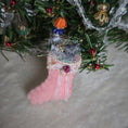 Load image into Gallery viewer, filled miniature Decorative pink stocking in front of a christmas tree
