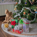 Load image into Gallery viewer, group of four miniature dollhouse christmas presents, hand wrapped