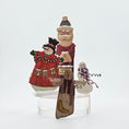 Load image into Gallery viewer, Dollhouse miniature Decorative Christmas figures including snowmen, and a Santa Claus on a white background.