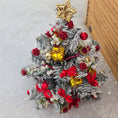 Load image into Gallery viewer, Decorative Christmas tree with red and gold ornaments on a light background