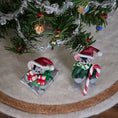 Load image into Gallery viewer, Two Christmas-themed Annalee style mice figurines near a tree branch with decorations.