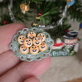Load image into Gallery viewer, miniature dollhouse snowman cookies on a platter with a Christmas tree in the background