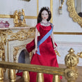 Load image into Gallery viewer, Elegant Royal Porcelain Dollhouse Dark Haired Lady in Red Silk Gown with Garnet Jewelry