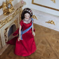 Load image into Gallery viewer, Elegant Royal Porcelain Dollhouse Dark Haired Lady in Red Silk Gown with Garnet Jewelry