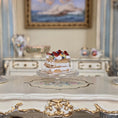 Load image into Gallery viewer, miniature pastry with fruit on a decorative table in an elegant room.