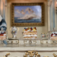 Load image into Gallery viewer, miniature dessert on a cake stand with a decorative interior background