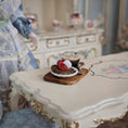 Load image into Gallery viewer, Miniature dessert with a glass of coffee on a decorative table in a dollhouse setting.