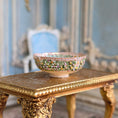 Load image into Gallery viewer, Decorative bowl on a ornate gold table with a blurred classical interior background