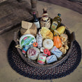 Load image into Gallery viewer, wood basket filled with various food items including cheeses, meats, and bottles
