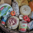 Load image into Gallery viewer, Assorted cheeses, meats, and canned goods in a wooden basket