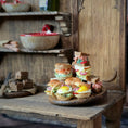 Load image into Gallery viewer, Assorted sandwiches on a wooden table with a rustic background