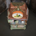 Load image into Gallery viewer, Decorative wooden box with intricate designs and a rooster illustration on a dark background