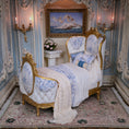Load image into Gallery viewer, Delicate bed with gold and blue accents in an ornate room.