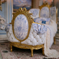 Load image into Gallery viewer, Decorative bed with gold frame and blue patterned fabric in an elegant room.