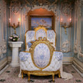 Load image into Gallery viewer, Opulent bed footboard with gold and white detailing in a decorative room.