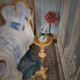Load image into Gallery viewer, Decorative figurine on a small stand in a miniature bedroom setting