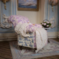 Load image into Gallery viewer, Vintage-style armchair with floral patterns in a decorative room.