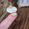 Load image into Gallery viewer, Small decorative tray on a finger with a blurred background