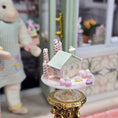 Load image into Gallery viewer, Putz-Style Easter House on Glass Cake Stand Spring Candy Cottage Vintage Artisan