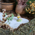 Load image into Gallery viewer, Hand Carved Wooden Folk Art Figurine of a Bunny Conductor with Singing Chicks