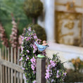Load image into Gallery viewer, Carolyn Rohal Hand-Sculpted Clay Blue Bird Figurine with Hat (2008)