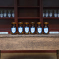 Load image into Gallery viewer, Mini Mundus Set of 6 Amber Glass Apothecary Bottles Style F Group 7