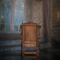 Load image into Gallery viewer, Hand-Carved Wood Tudor-Style Armchair with Floral Medallion Back