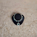 Load image into Gallery viewer, Sun Lemmens Emerald & Crystal Royal Necklace on Display Bust Netherlands