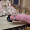 Load image into Gallery viewer, Sun Lemmens Emerald & Crystal Royal Necklace on Display Bust Netherlands