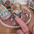 Load image into Gallery viewer, Catherine Muniere Blonde Little Girl Pointing Finger in Floral Dress 1:12 IGMA Fellow