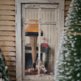 Load image into Gallery viewer, Miniature Leg Lamp – A Christmas Story Replica, back view, as seen through a window