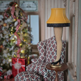 Load image into Gallery viewer, Miniature Leg Lamp – A Christmas Story Replica, side view in a cozy living room