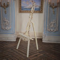 Load image into Gallery viewer, Decorative gilt easel in an ornate room