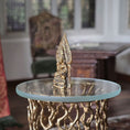 Load image into Gallery viewer, Decorative table with a gold and bronze statue in a room setting
