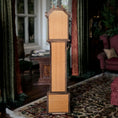 Load image into Gallery viewer, Wooden grandfather clock in a room with patterned rug and furniture