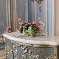 Load image into Gallery viewer, Decorative table with a bowl of fruit on a marble surface, ornate gold detailing, and a blurred background.