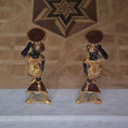 Load image into Gallery viewer, Top view of two ornate pedestal figures on a marble surface