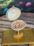 Load image into Gallery viewer, Artisan Signed, 'Hiller' sculpted vintage miniature baby in glittered footed pink egg stand