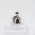 Load image into Gallery viewer, Small model of a church on a clear stand against a white background