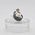 Load image into Gallery viewer, Decorative snowball display with a sign on a clear stand against a white background